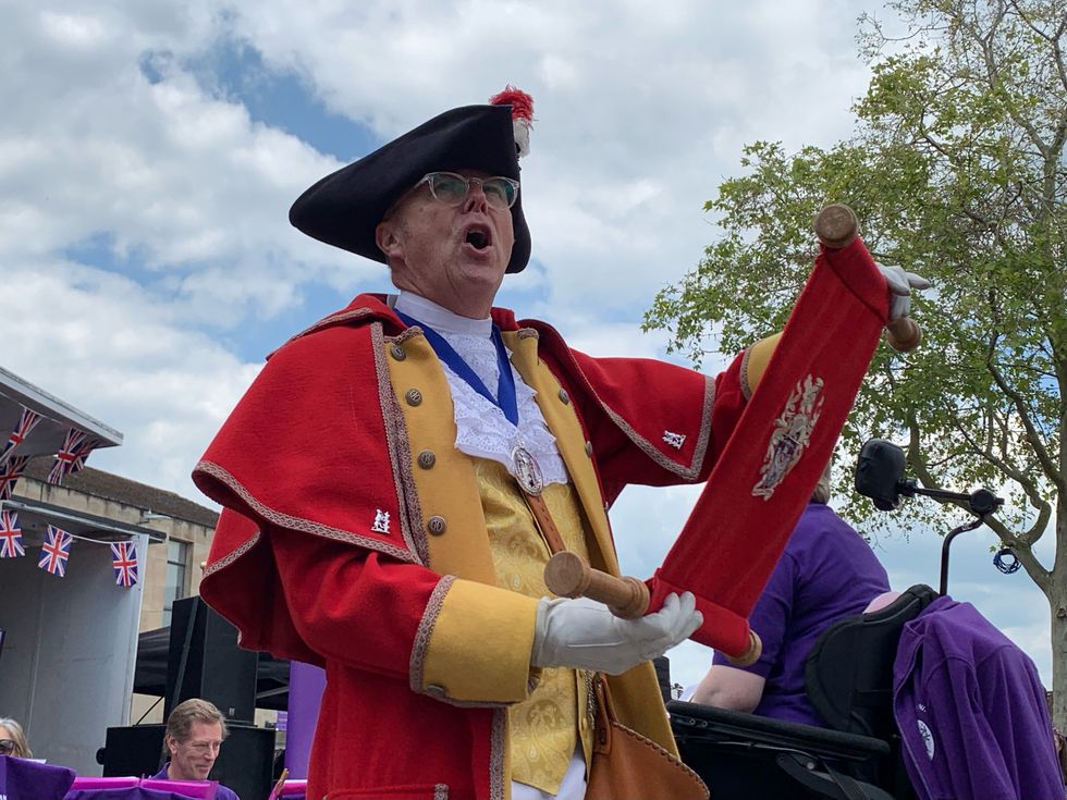 Town crier Mike Reddy