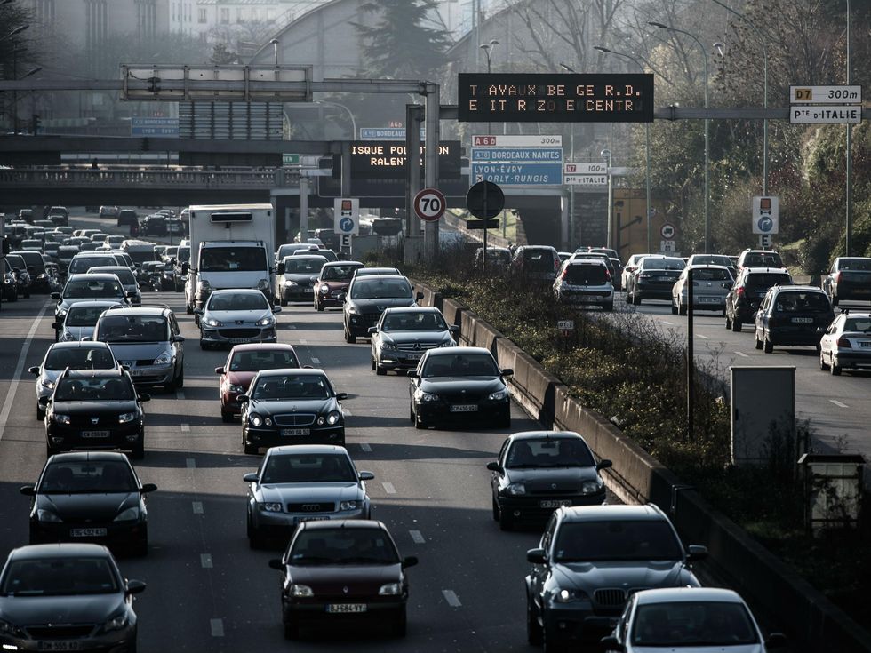 Traffic on the 'peripherique', the main ring road in Paris, the day before alternate traffic circulation measures were introduced to ease persistent pollution
