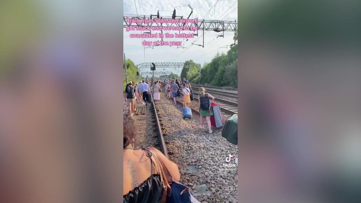 Train passengers forced to walk down tracks as heatwave causes evacuation