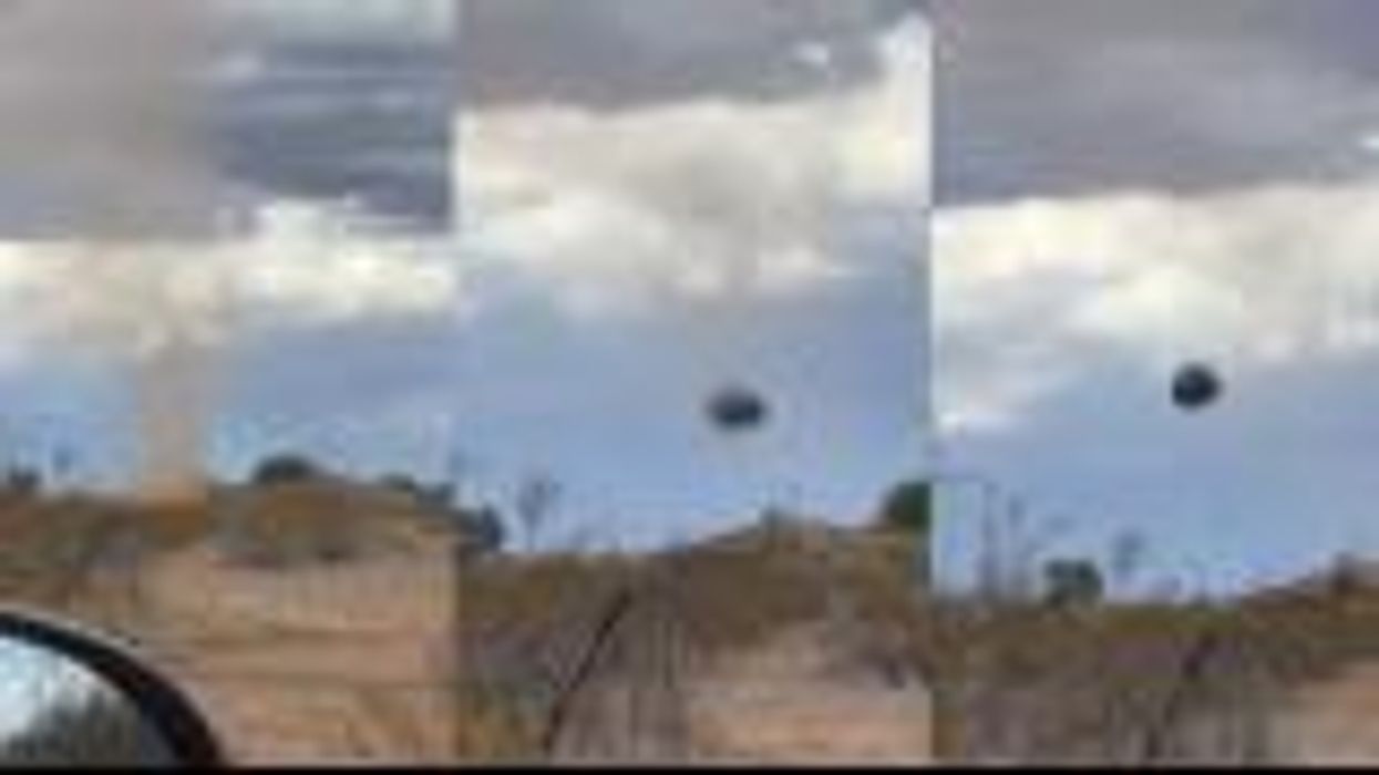 Moment huge dust cloud picks up trampoline and sends it flying