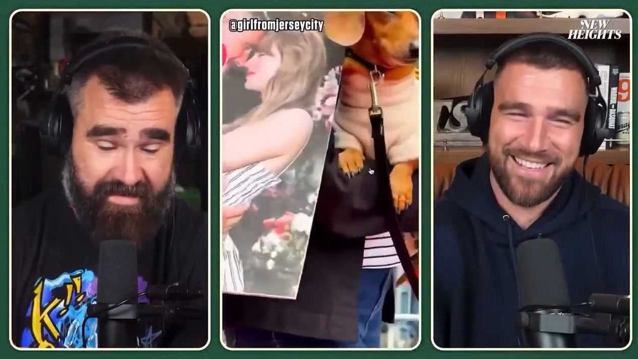 Watch as Travis Kelce howls at dog dressed as Taylor Swift's engagement ring