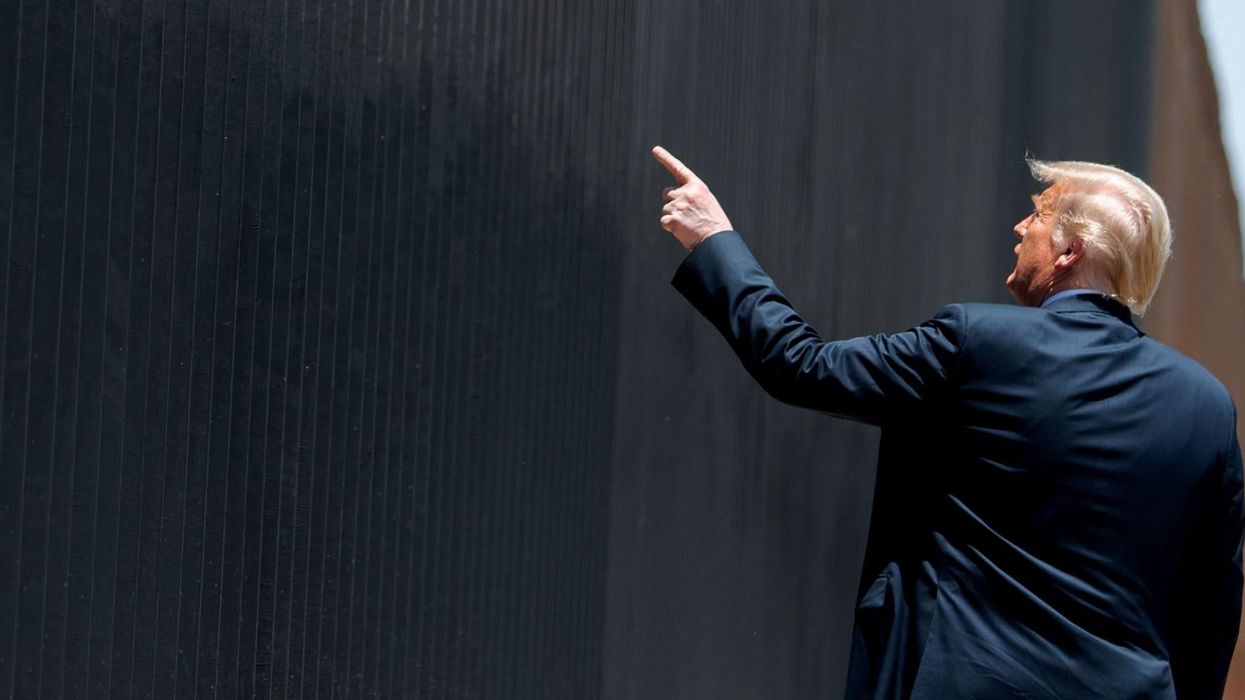 Trump having a look at his wall at the Mexican border.