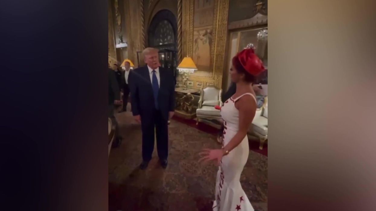 Trump says woman in MAGA dress has the 'greatest outfit'