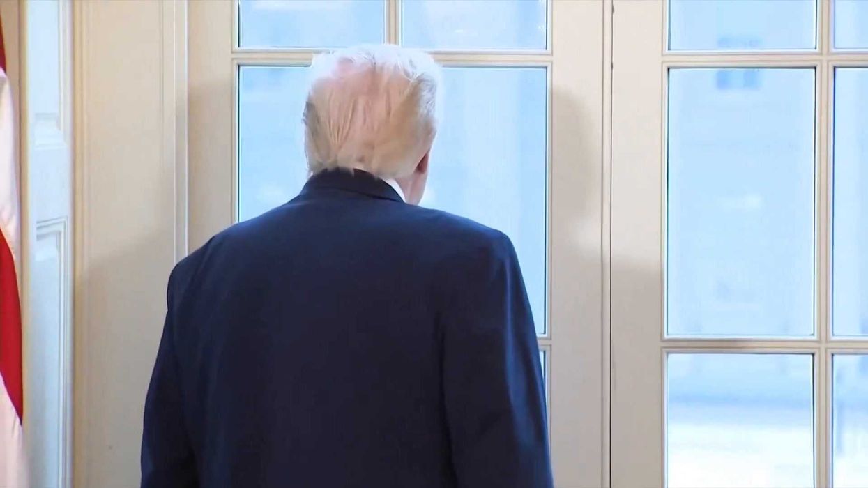 Trump's random moment admiring ballroom renovations turns into hilarious meme
