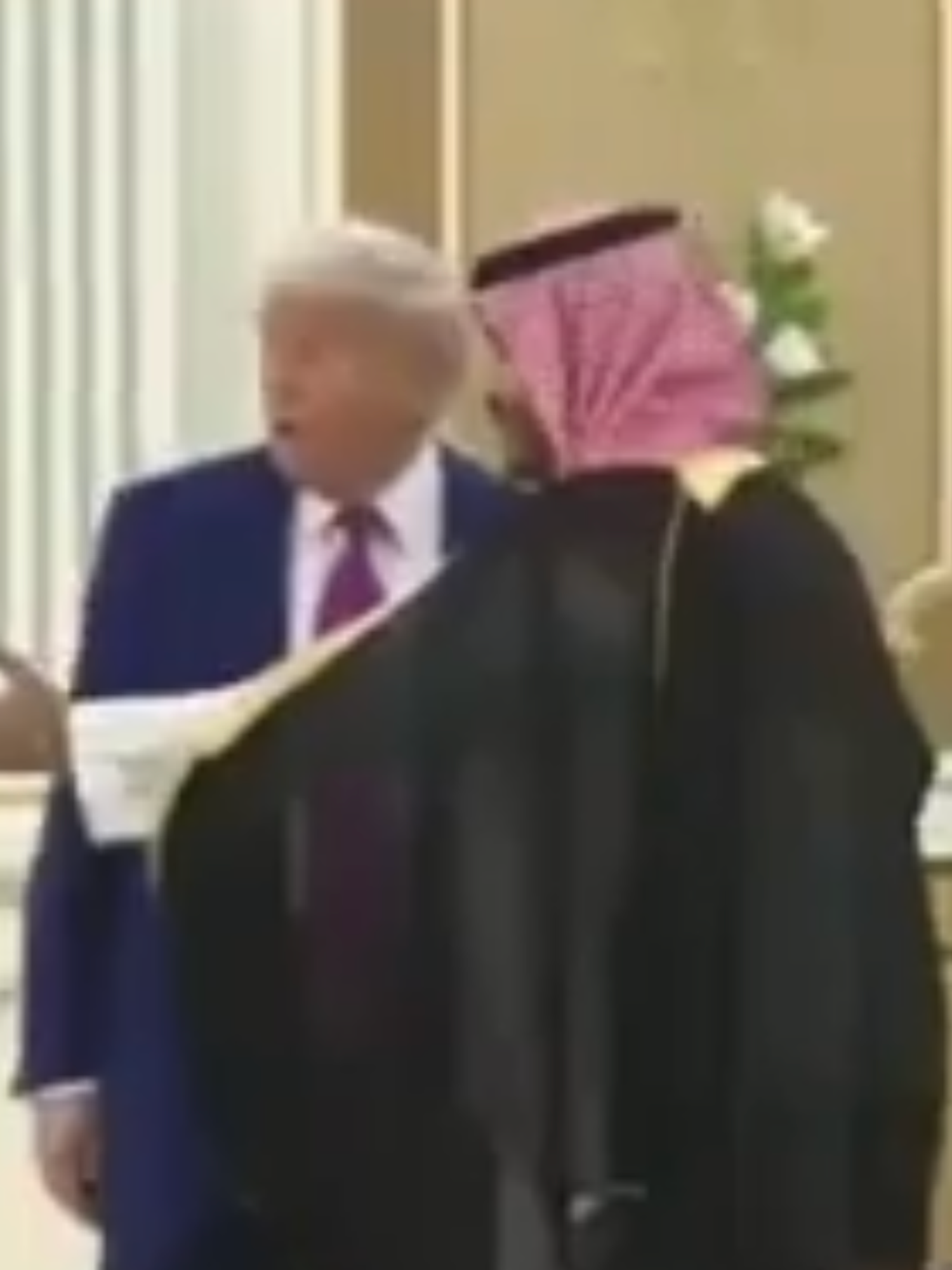 Trump walks in wrong direction and has to be reminded to sign deal