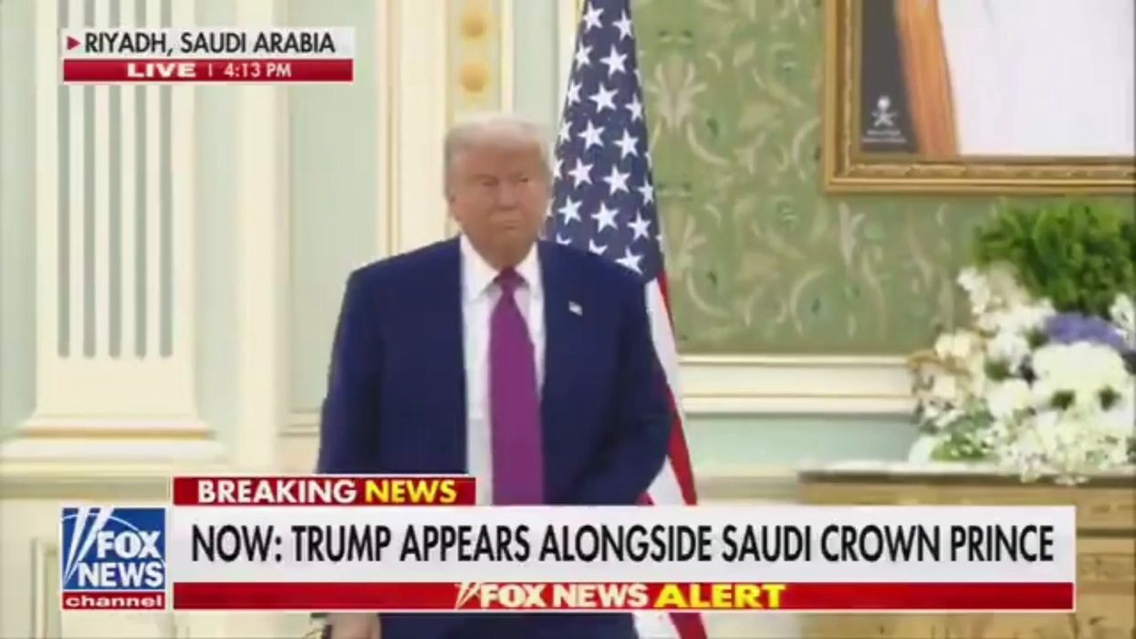 Trump walks in wrong direction and has to be reminded to sign deal