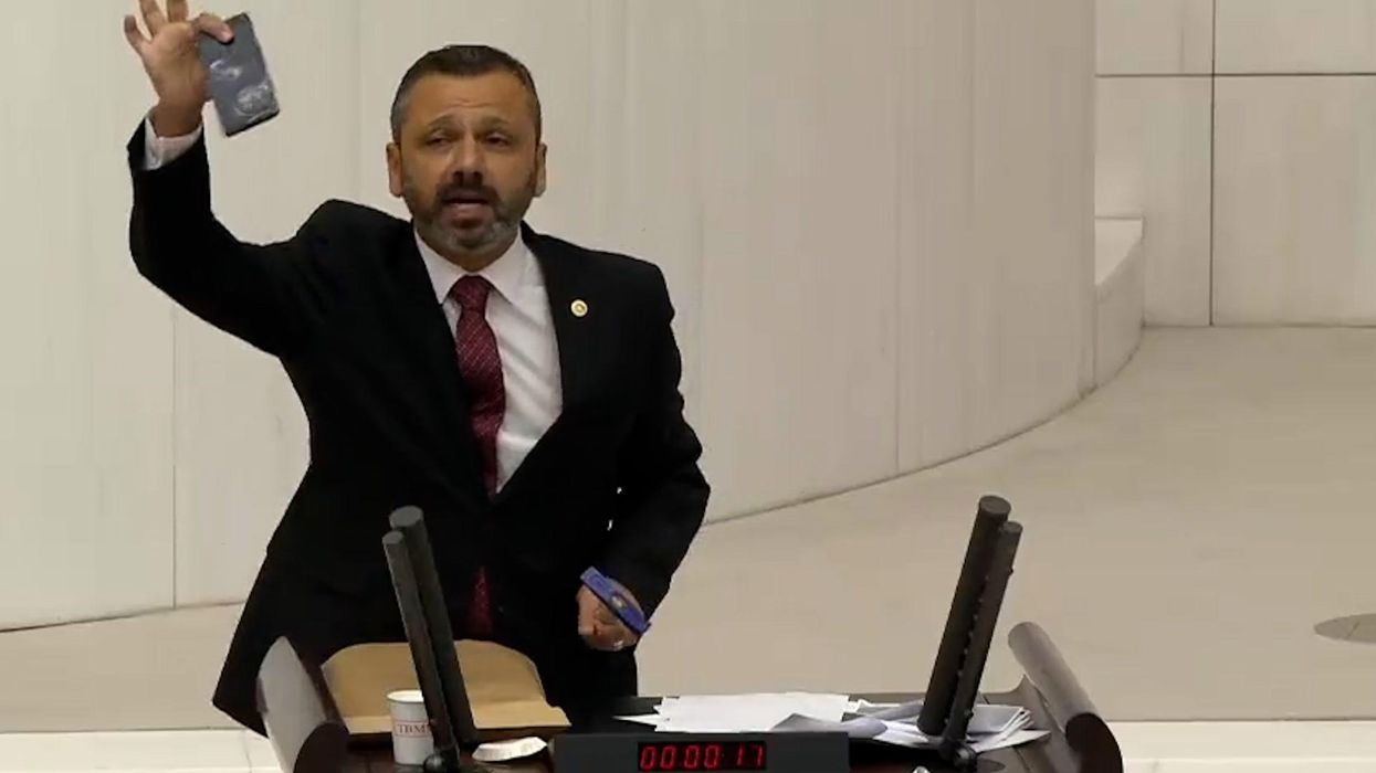 Turkey MP smashes phone with hammer in parliament in misinformation protest