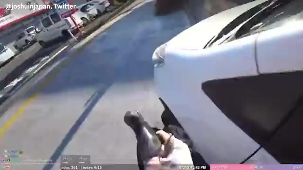 IRL Twitch streamer shocked as high-speed car crash happens right