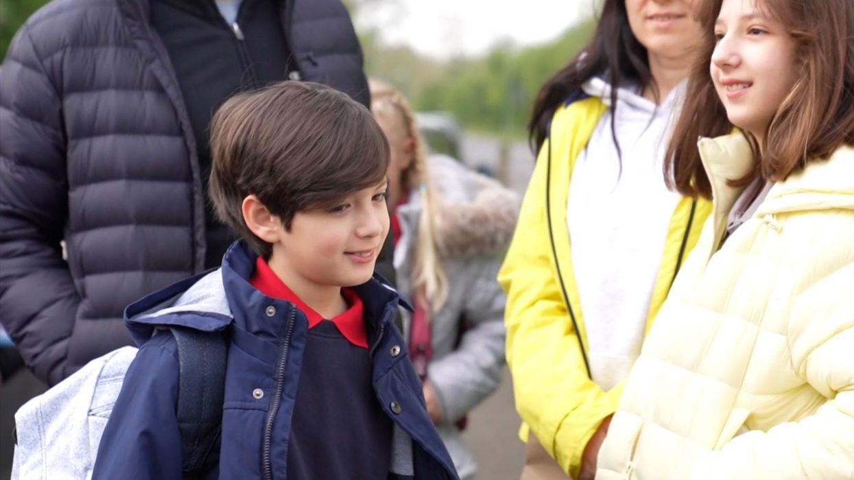Ukrainian children are welcomed on their first day of school in the UK