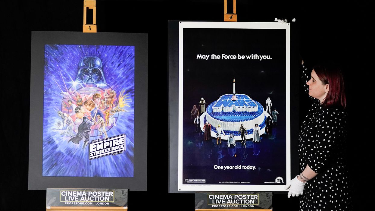 Two of the posters go on show in Rickmansworth, Hertfordshire (Andrew Matthews/PA)