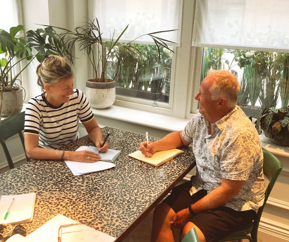 Two people sitting together