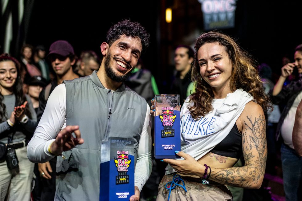 Two people standing together and smiling