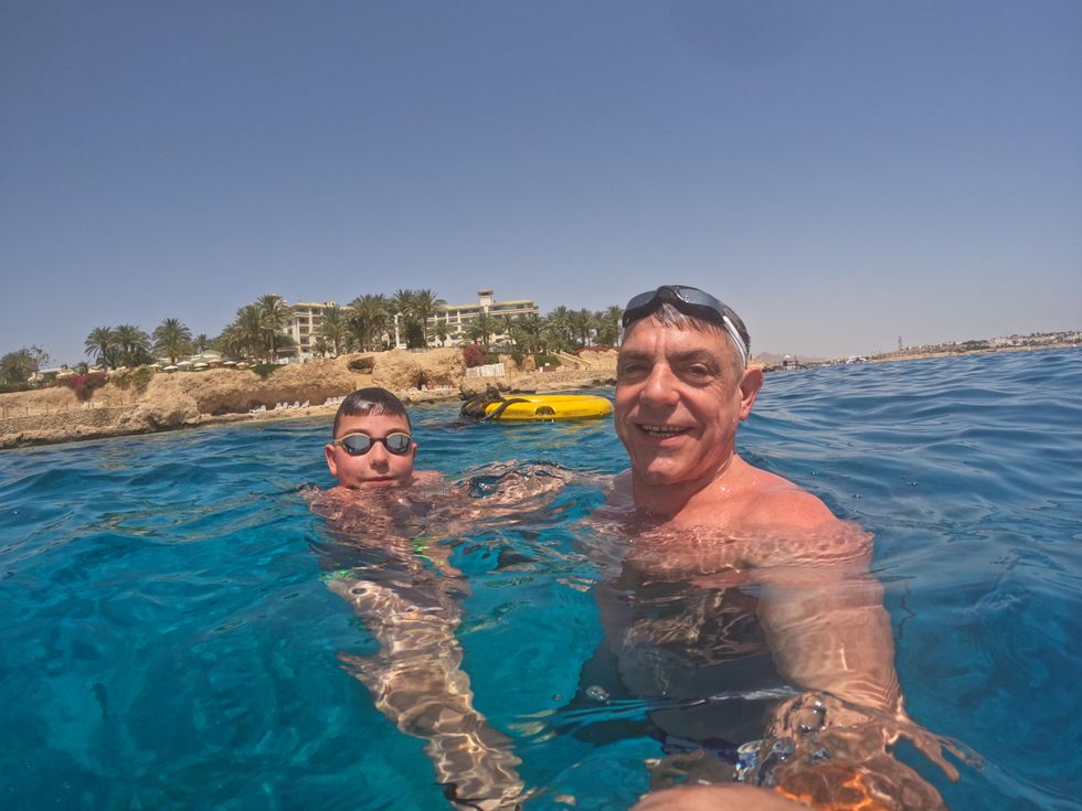 Two people with their head above water