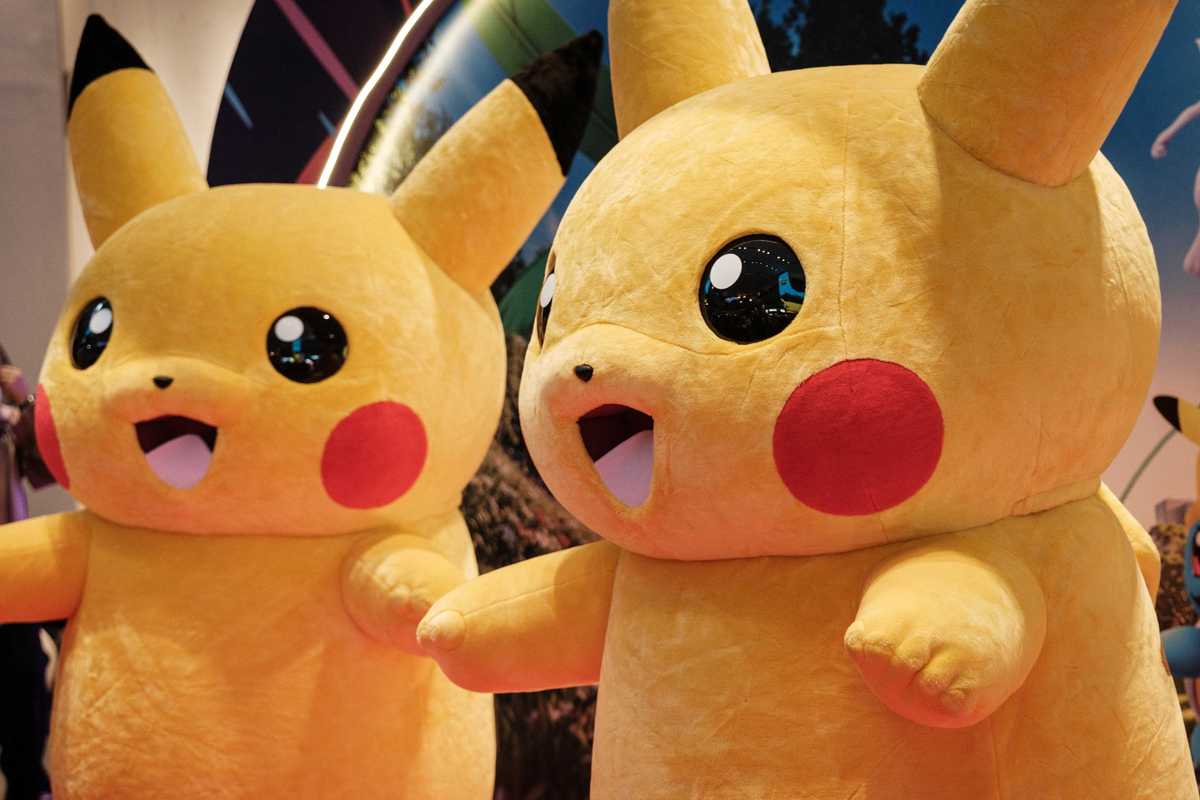 Two Pikachu mascots pose for a photograph during 'Pokemon GO Fest Global', a worldwide event marking the 10th anniversary of Pokemon GO, an augmented reality mobile game, at Agora Mall in Jakarta on July 11, 2026