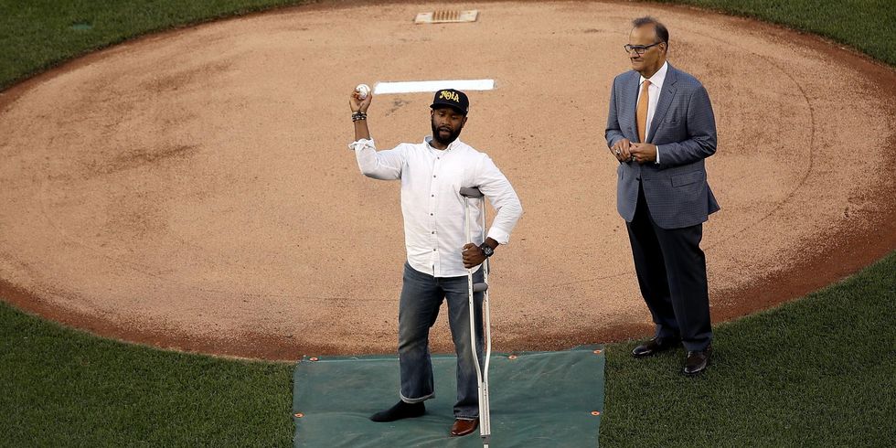 U.S. Capitol Hill special agent David Bailey, wounded alongside special agent Crystal Griner protecting U.S. Rep. Steve Scalise, throws the first pitch before the Congressional Baseball Game, Picture: