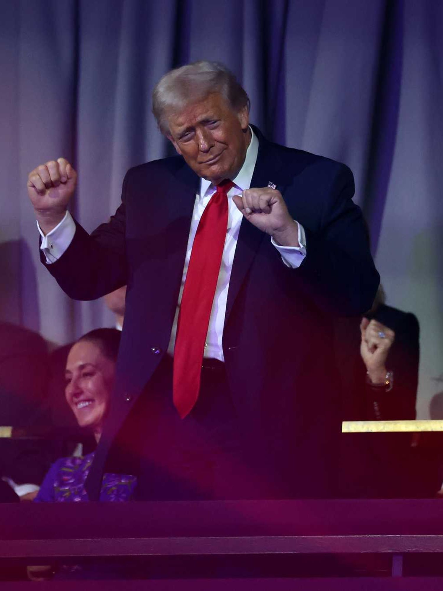 U.S. President Donald Trump dances to the final performance of the Village People during the FIFA World Cup 2026 Official Draw at John F. Kennedy Center for the Performing Arts on December 05, 2025 in Washington, DC