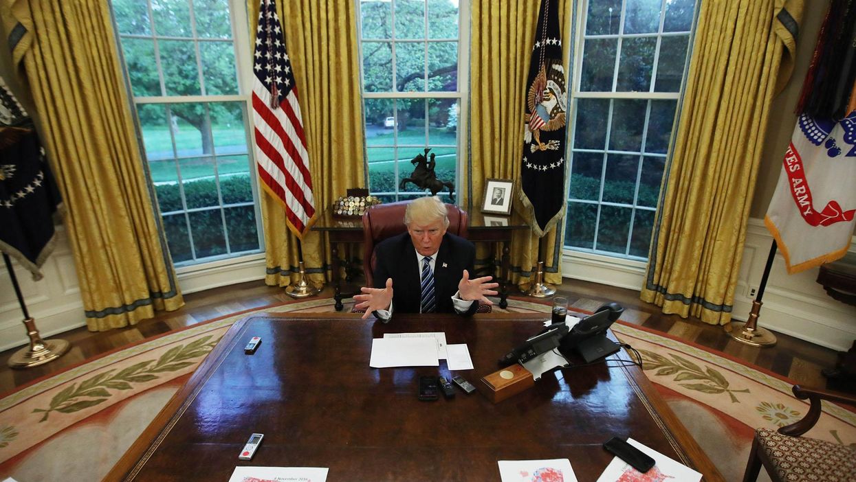 U.S. President Donald Trump speaks during an interview with Reuters in the Oval Office of the White House in Washington