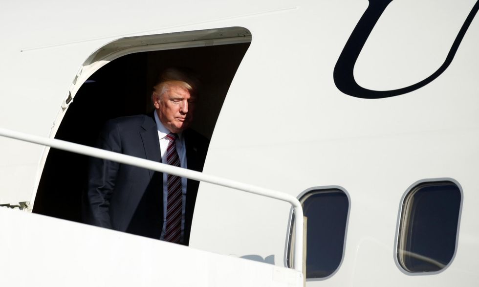 U.S. President Donald Trump steps from Air Force One as he arrives in Morristown to spend the weekend at his golf club in nearby Bedminster, New Jersey, U.S., September 29, 2017. Picture: