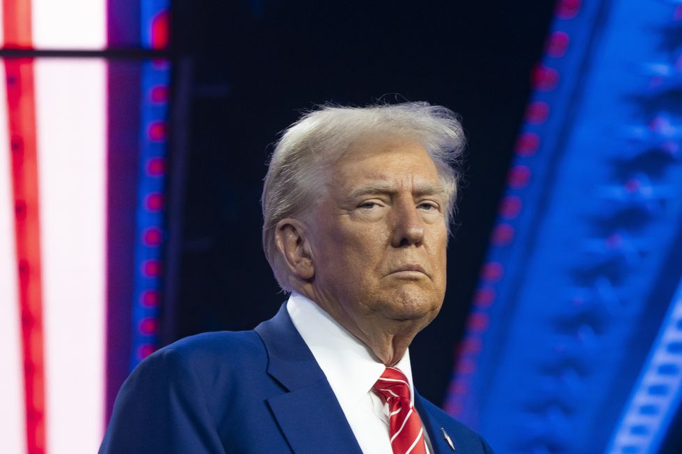 U.S. President-elect Donald Trump looks on during Turning Point USA's AmericaFest at the Phoenix Convention Center on December 22, 2024 in Phoenix, Arizona