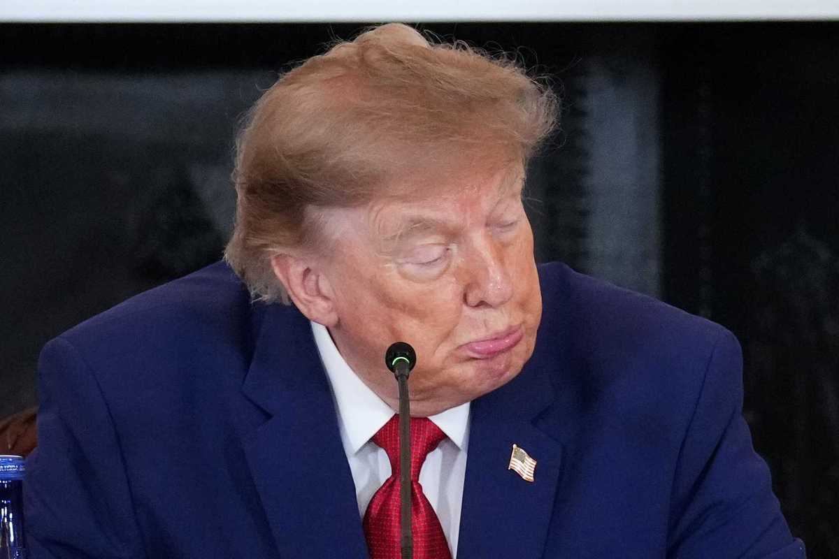 U.S. Secretary of State Marco Rubio (R) looks on as U.S. President Donald Trump speaks during a roundtable on the American mining industry at the U.S. Department of State on August 07, 2026 in Washington, DC