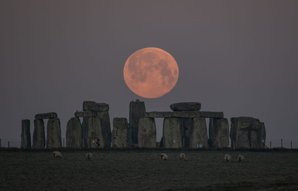 <p>\u201cPink\u201d Supermoon over Stonehenge in Salisbury, UK last night.</p>
