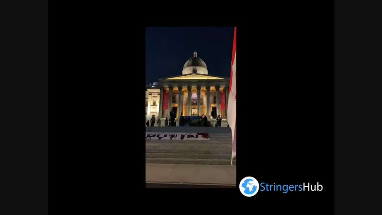 Protestor played air raid siren at Ukraine protest in London