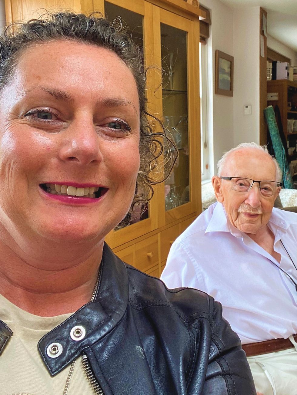 Undated handout photo issued by Lucy Teixeira showing Lucy with her father, Captain Sir Tom Moore. His daughter has said her father would have been \u201cchuckling\u201d after plans were unveiled to plant trees around the world in his honour. His daughter, Lucy Teixeira, 52, said she hopes the Trees for Tom initiative will result in a wood in his home county of Yorkshire and the reforestation of part of India, where he served during the Second World War. Issue date: Thursday February 25, 2021