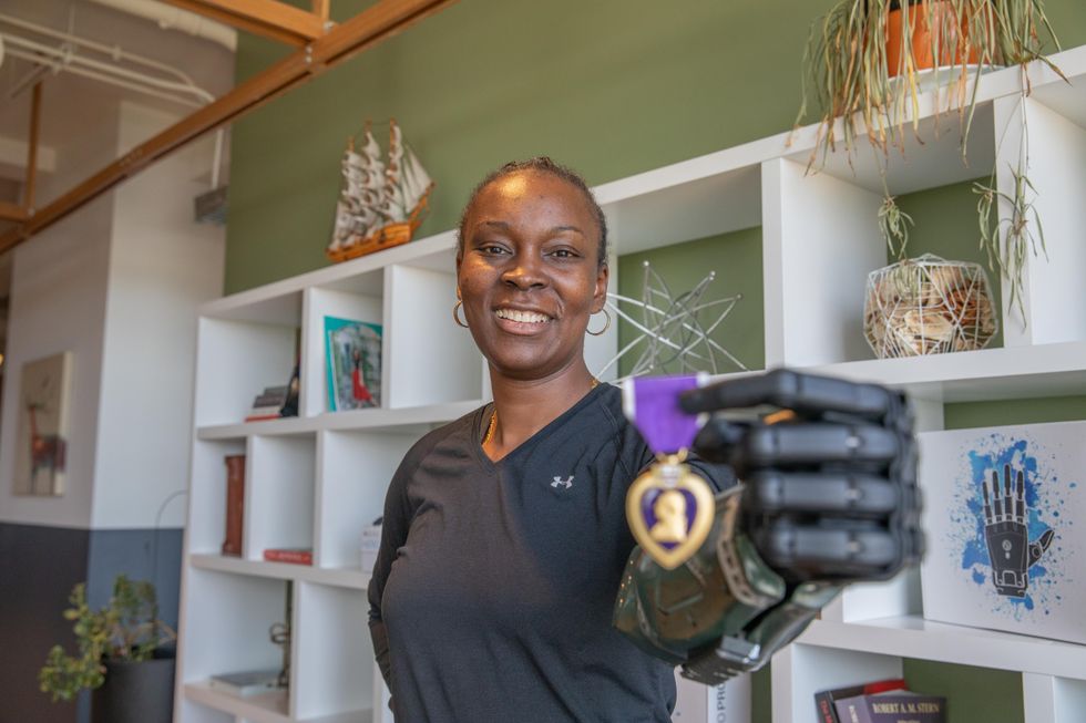US veteran becomes first to get new bionic arm designed by UK firm