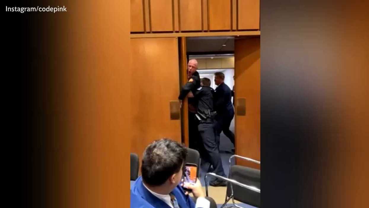 Shocking moment US Marine veteran dragged from Senate hearing and has arm broken