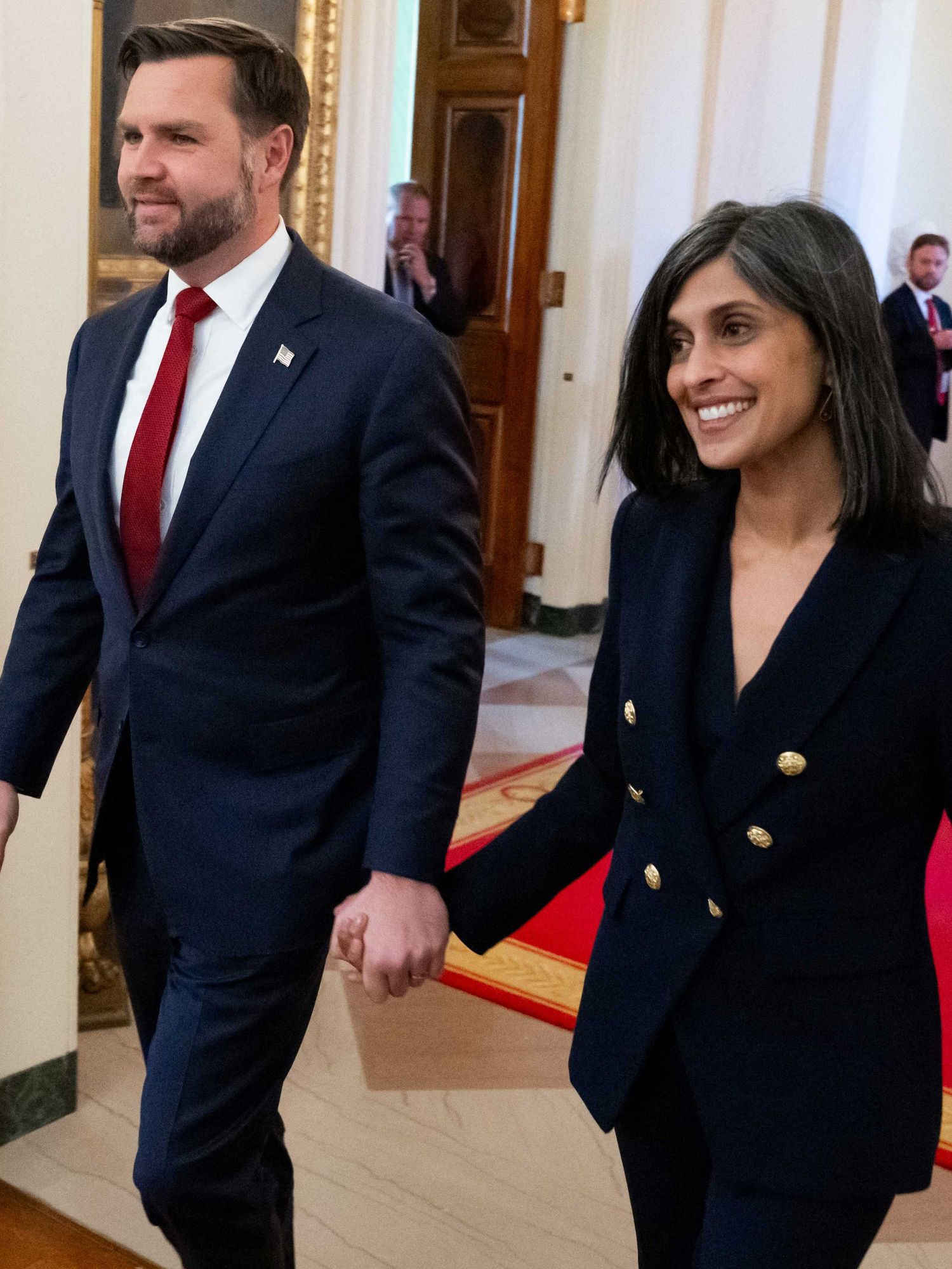US Vice President JD Vance and Second Lady Usha Vance arrive for President Donald Trump to sign an executive order on foster children and families in the East Room of the White House in Washington, DC, November 13, 2025