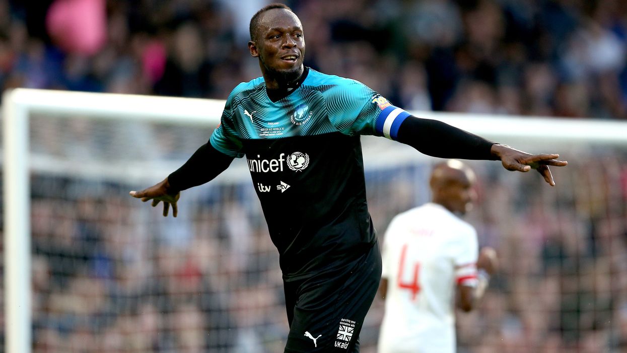 Usain Bolt participating in a football match