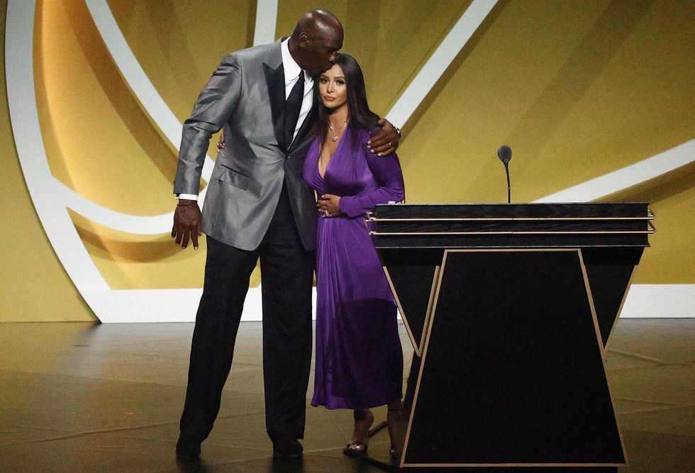 Vanessa Bryant is greeted by presenter Michael Jordan after speaking on behalf of Class of 2020 inductee, Kobe Bryant during the 2021 Basketball Hall of Fame Enshrinement Ceremony 