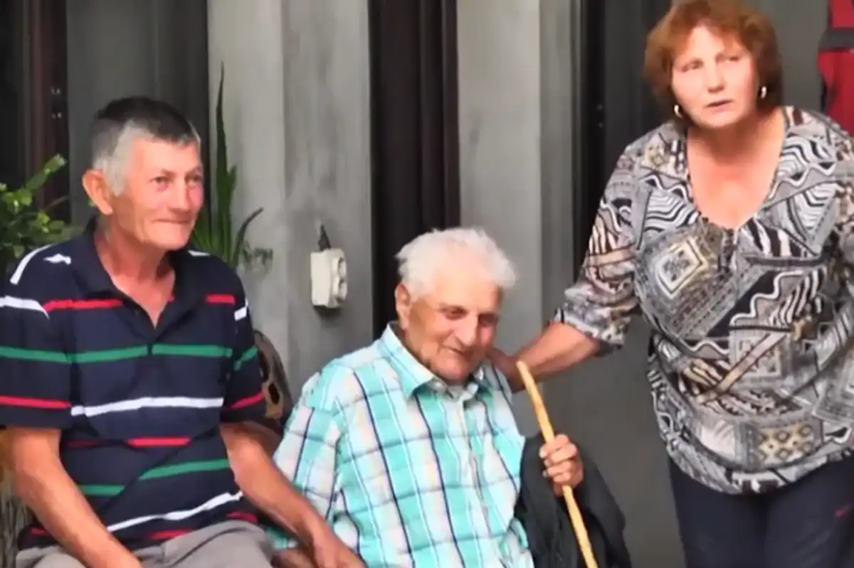 Vasile Gorgos with family members following his return home in 2021
