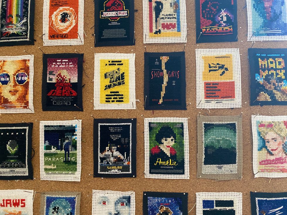 Self-professed ‘movie buff’ makes her mark with mini cross-stitch film posters