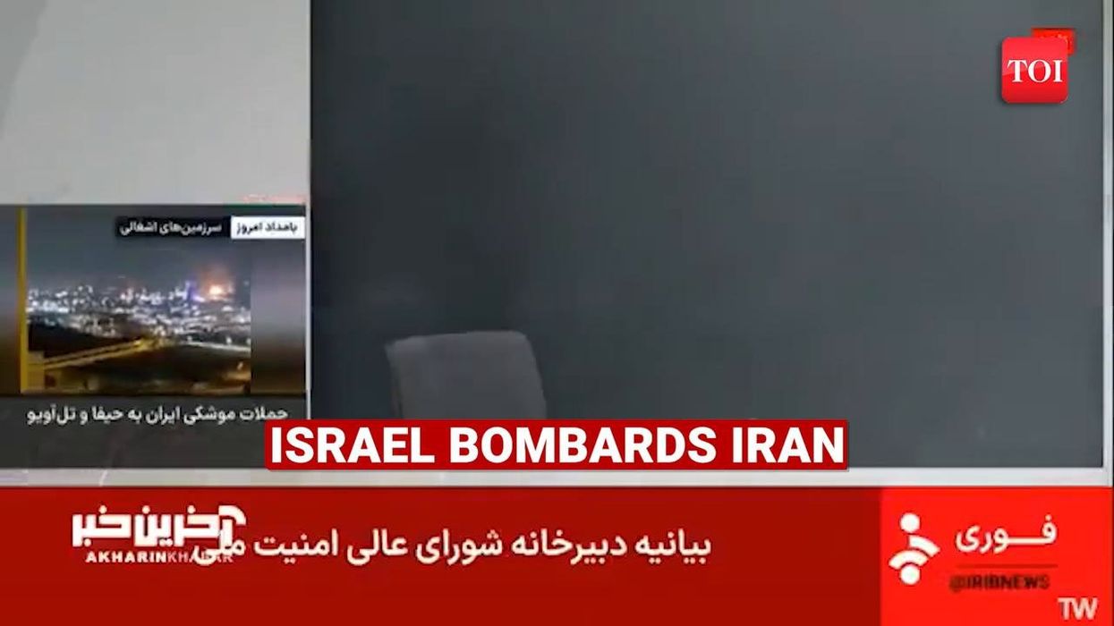 Presenter flees news desk on Iranian TV as studio attacked