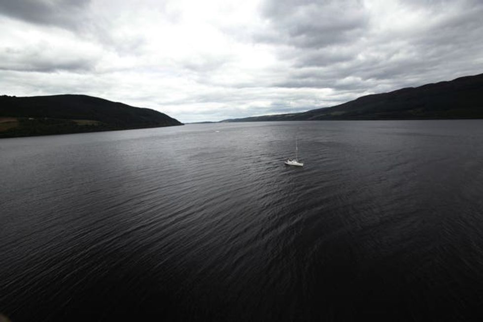 View from above of a yacht on Loch Ness