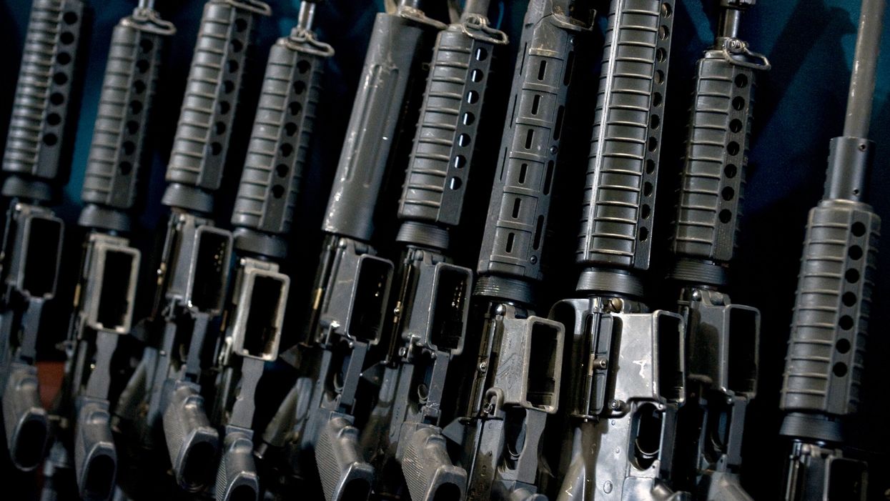 <p>View of guns seized in the arrest of Raul Hernandez Lechuga (not in frame) --an alleged member of drugs cartel "Los Zetas"-- on display during a presentation to the press, in Mexico City, on December 13, 2011.</p>