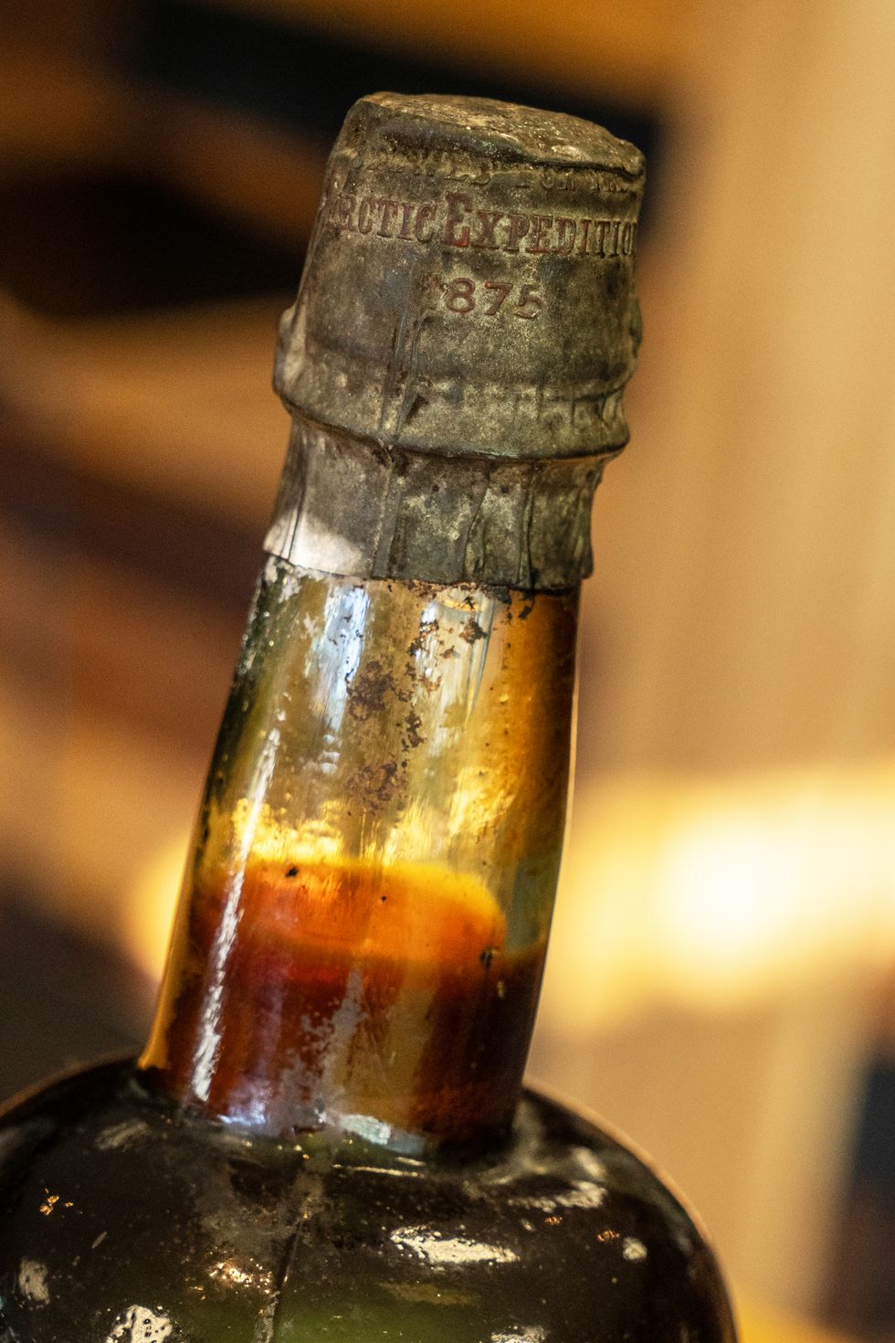 View of the seal on a bottle of beer, which reads 'Arctic expedition 1875'