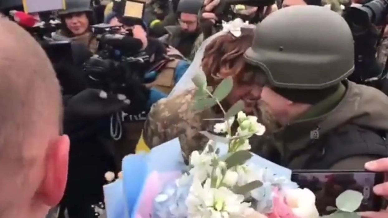 Ukrainian soldiers get married on the frontline near Kyiv