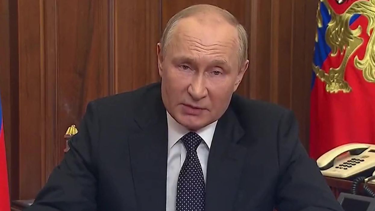 Putin mocked for making 'high tech military threats' while sat next to two landlines and a fax machine