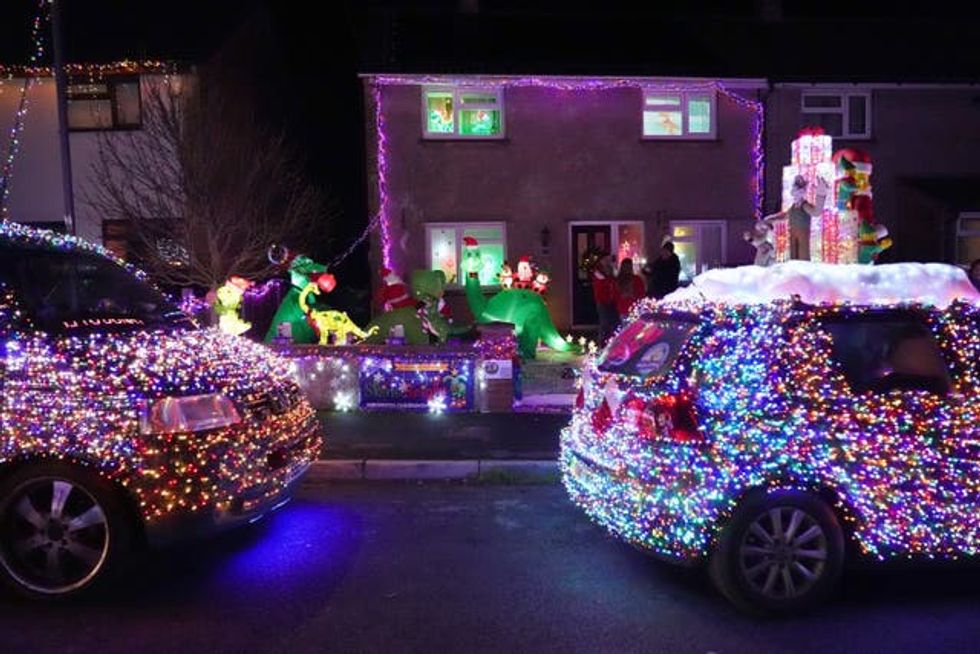 VW vans decked out in thousands of lights