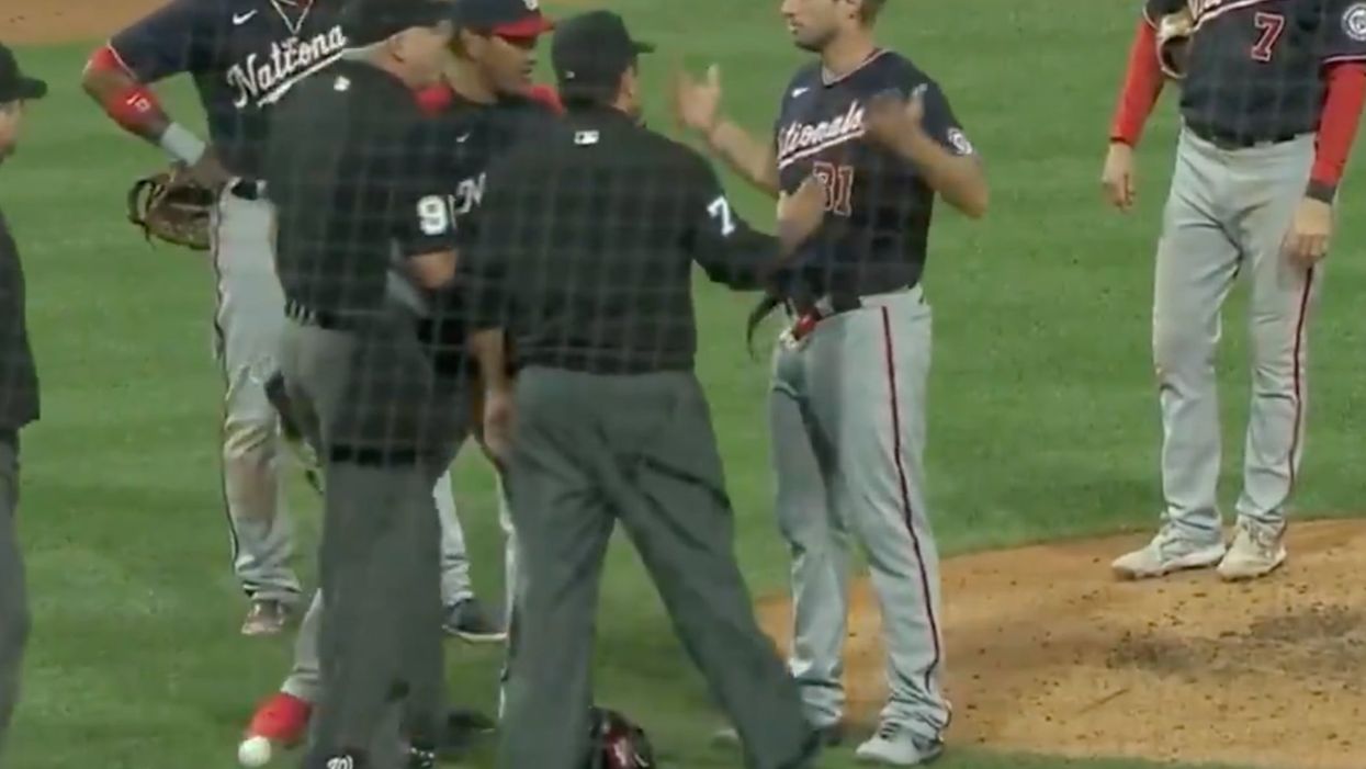 Washington Nationals pitcher Max Scherzer threatens to remove his pants.