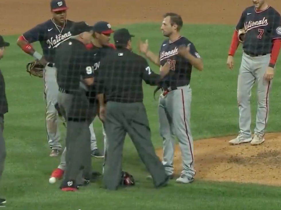 Washington Nationals pitcher Max Scherzer threatens to remove his pants.