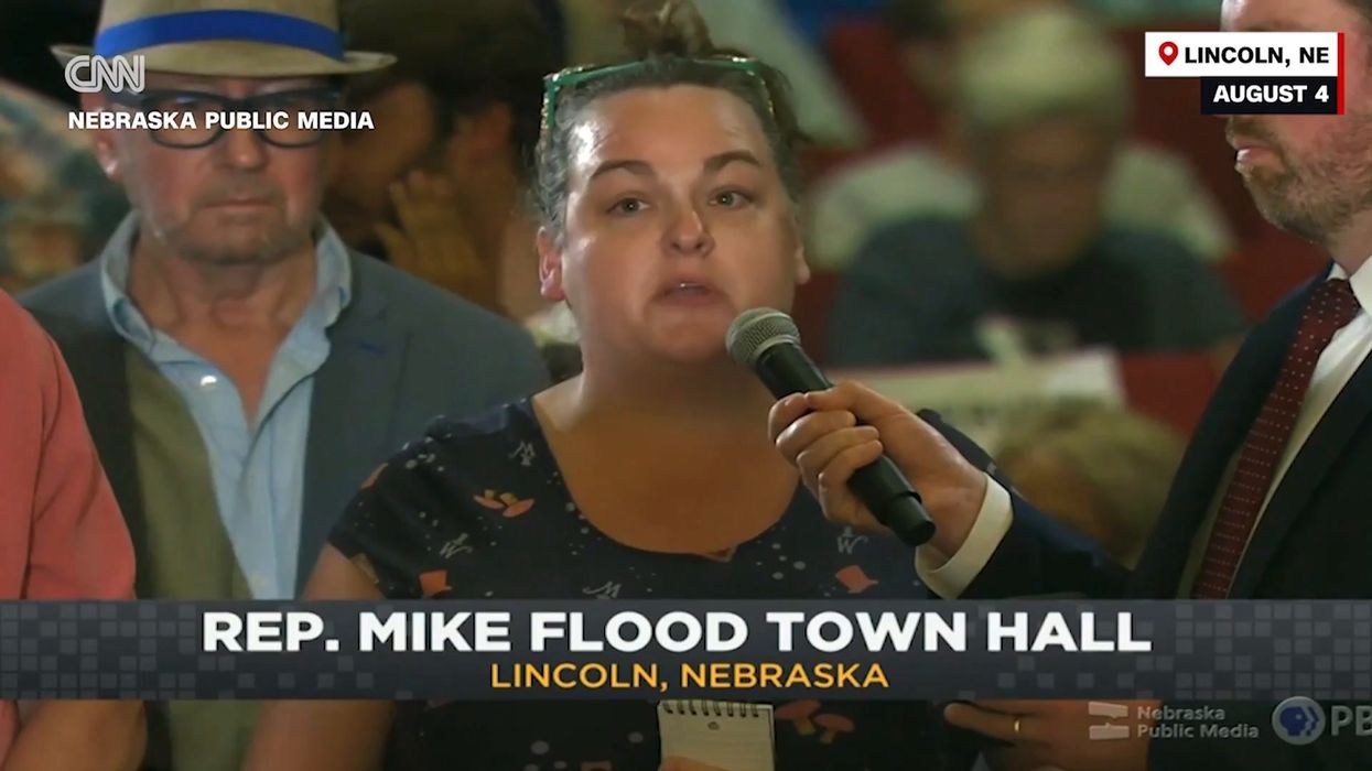 Watch Mike Flood get viciously booed in epic take down at Nebraska town hall