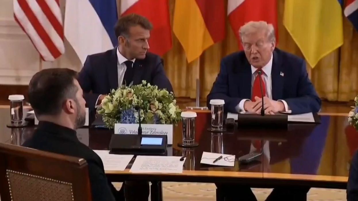 Watch Macron's priceless reaction to Trump rambling about Putin