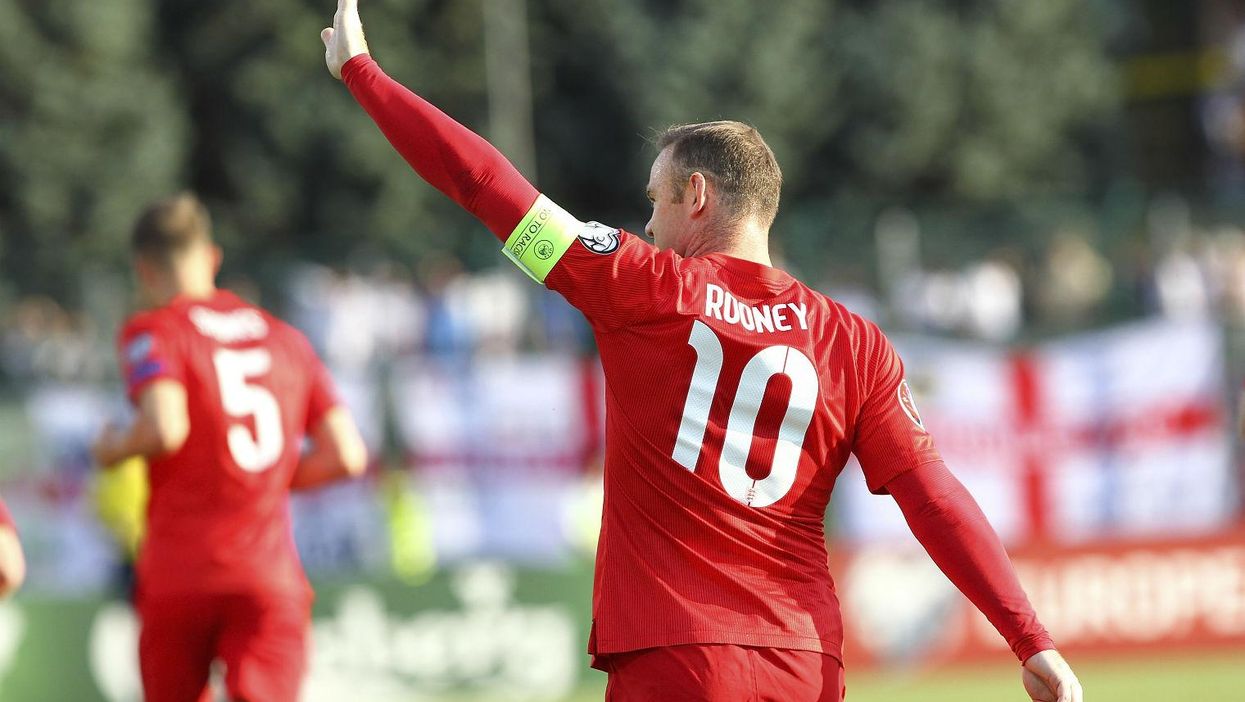 Wayne Rooney celebrates scoring his 49th international goal