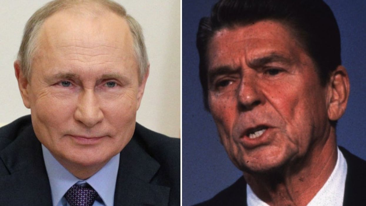 <p>When world collide - Souza’s photograph shows what looks a “young Putin” before he was in power alongside President Reagan </p>