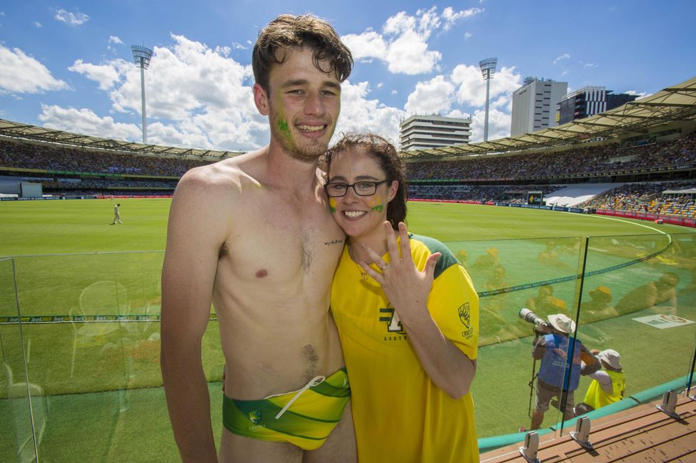Where he hiding the ring? Michael Langridge re-enacts his proposal to Tori Roebuck on the pool deck of the Gabba.
