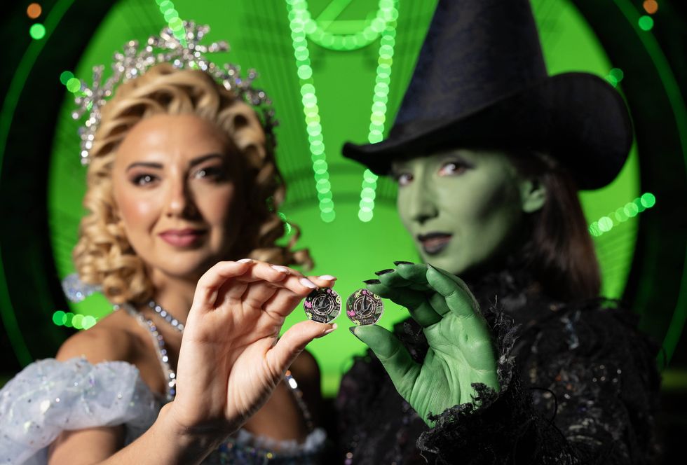 Wicked coins being held up