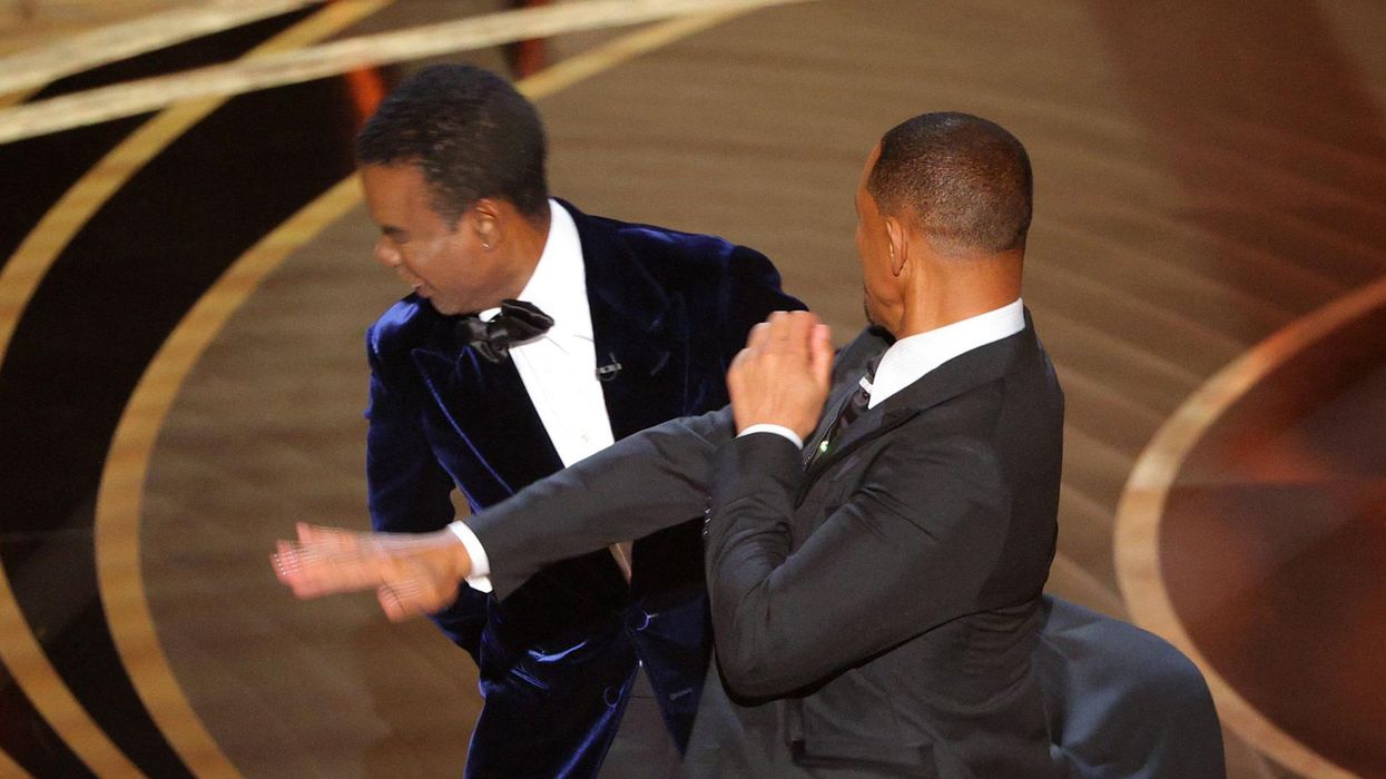 Will Smith smacks Chris Rock on Oscars stage after he made joke about his wife